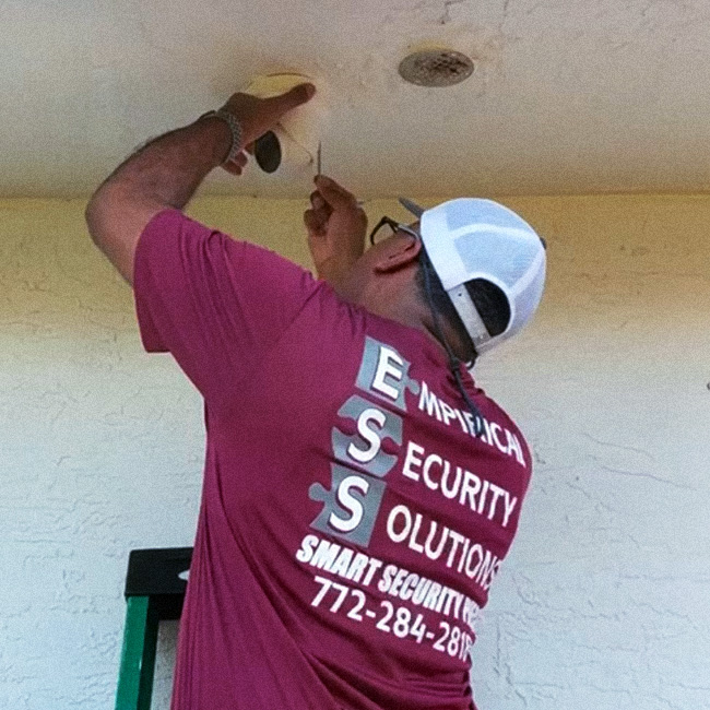 professional installing outdoor camera in port st lucie fl